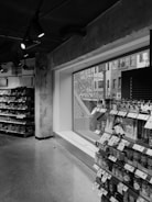 a black and white photo of a grocery store