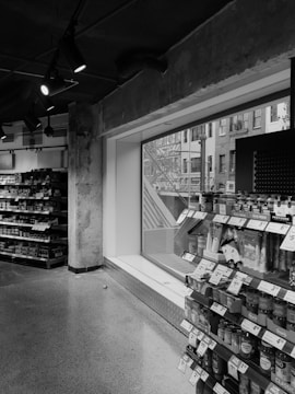 a black and white photo of a grocery store