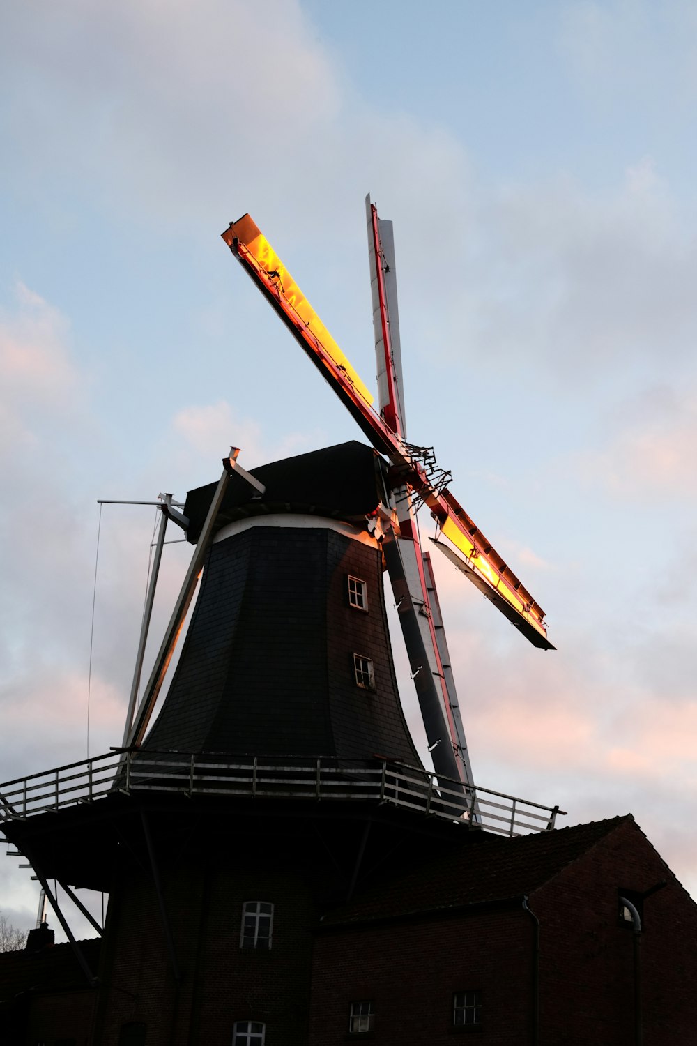 a windmill with a ladder on top of it