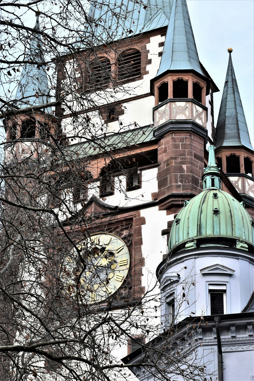 a large building with a clock on the side of it