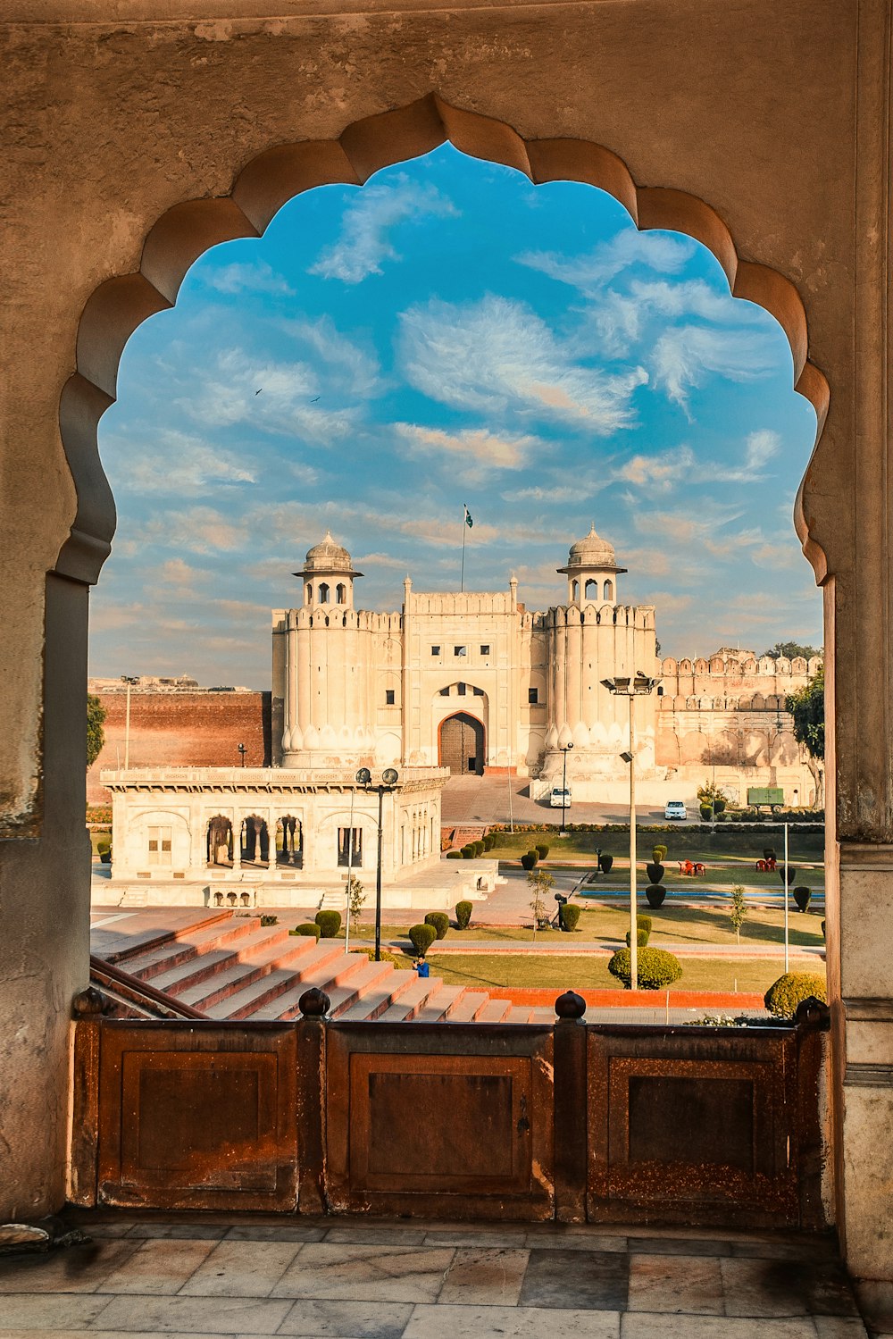 a view of a castle through an archway