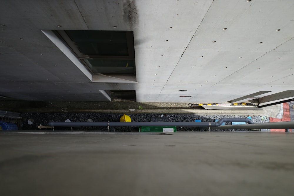 an empty parking garage with graffiti on the walls