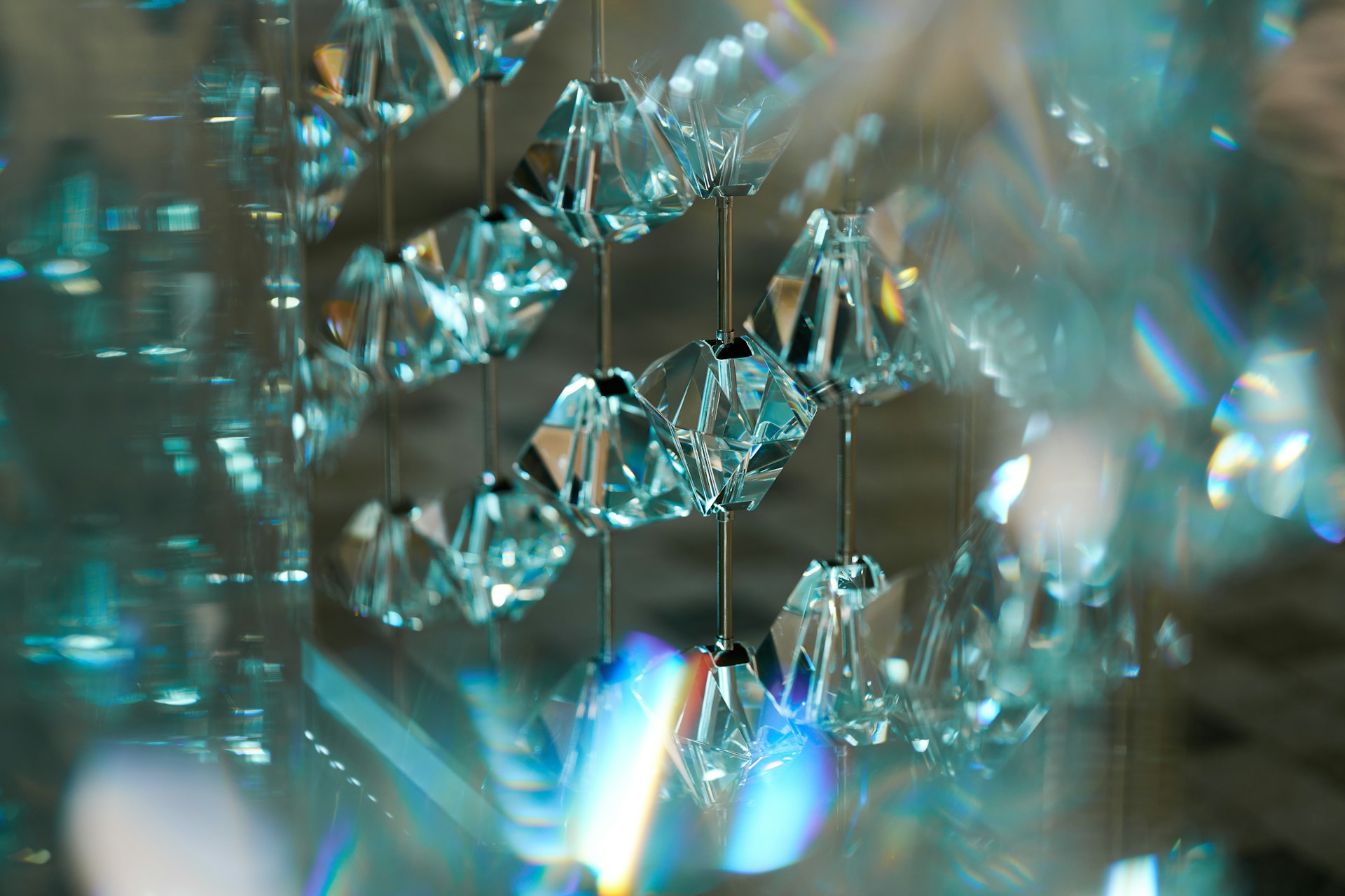 a group of crystal beads hanging from a ceiling