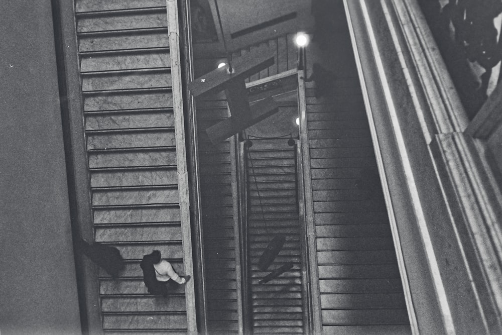 a woman walking down a flight of stairs