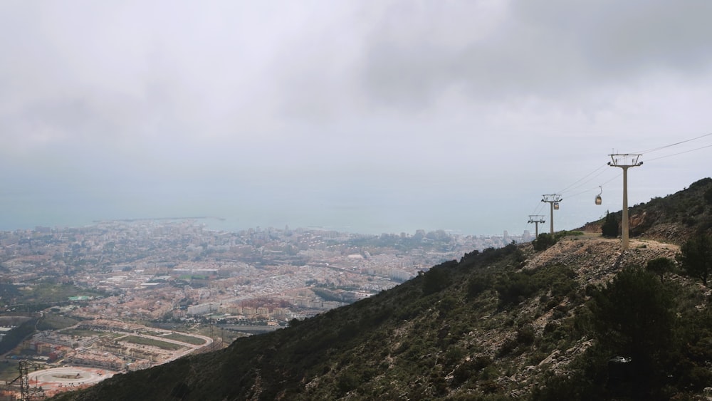 a view of a city from the top of a hill