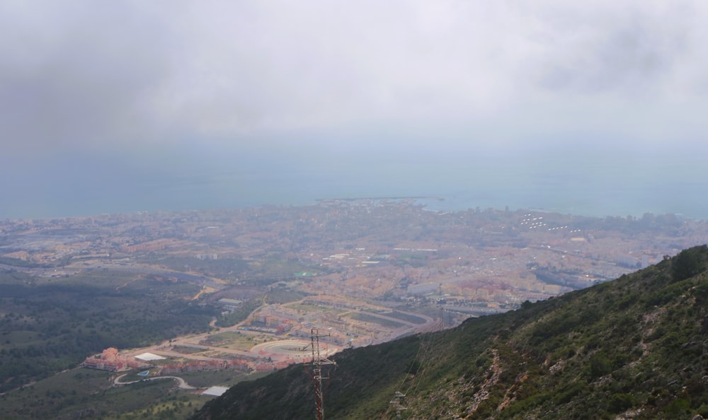 a view of a city from the top of a hill