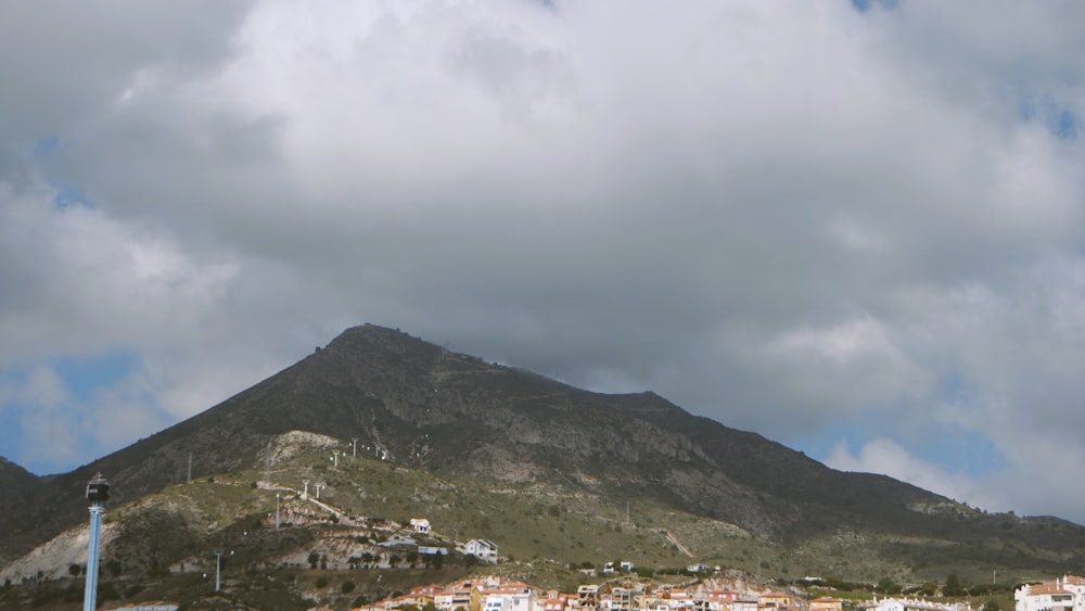 a view of a city with a mountain in the background