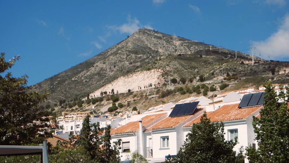 a view of a city with a mountain in the background