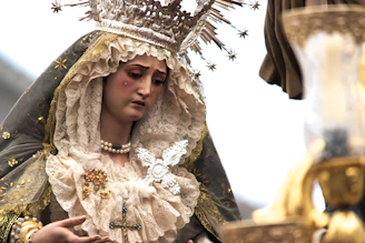 a statue of a woman wearing a crown
