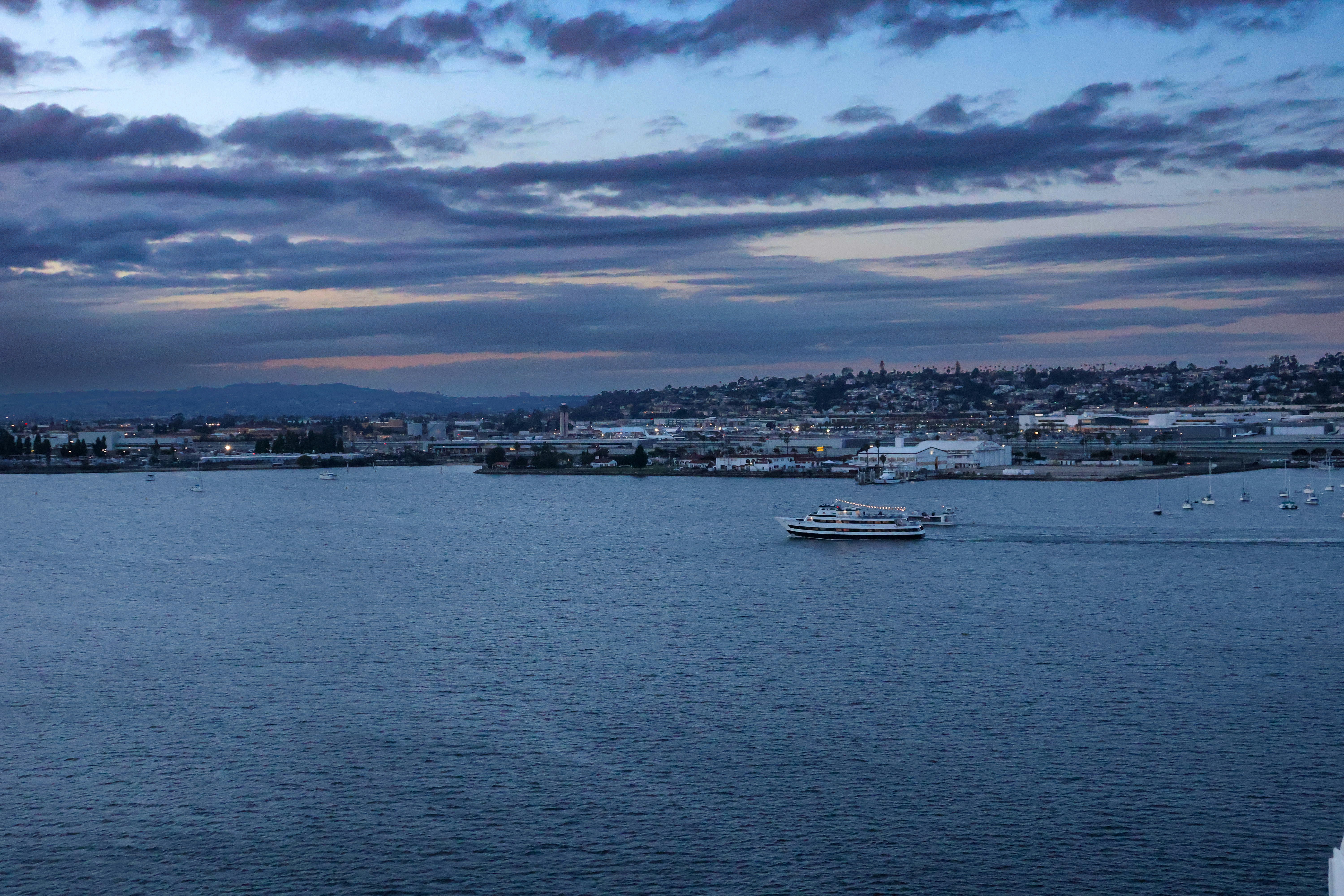 a large body of water with a boat in it