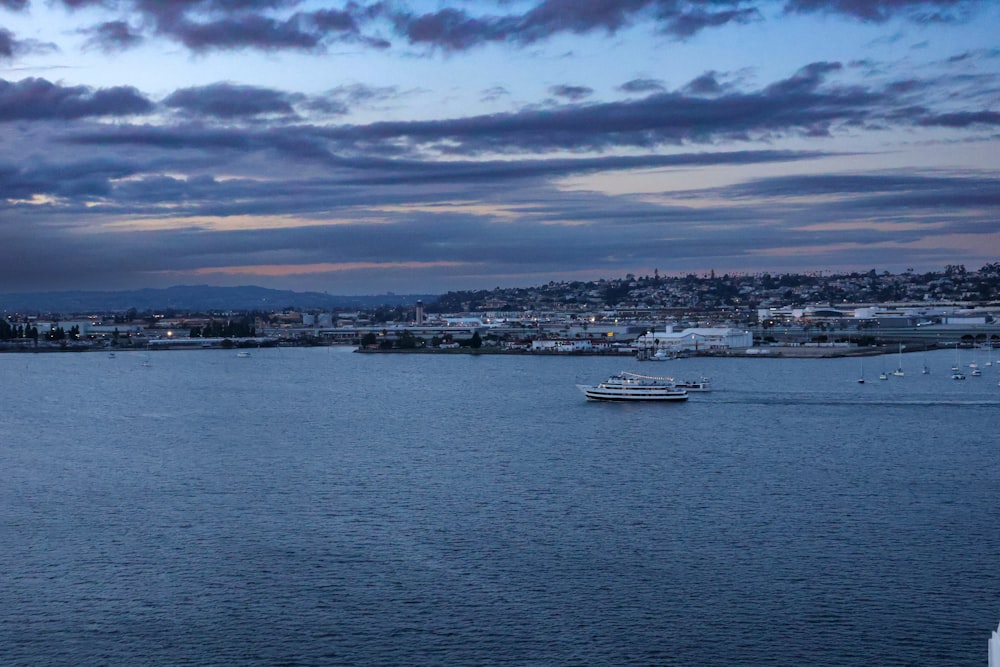 a large body of water with a boat in it