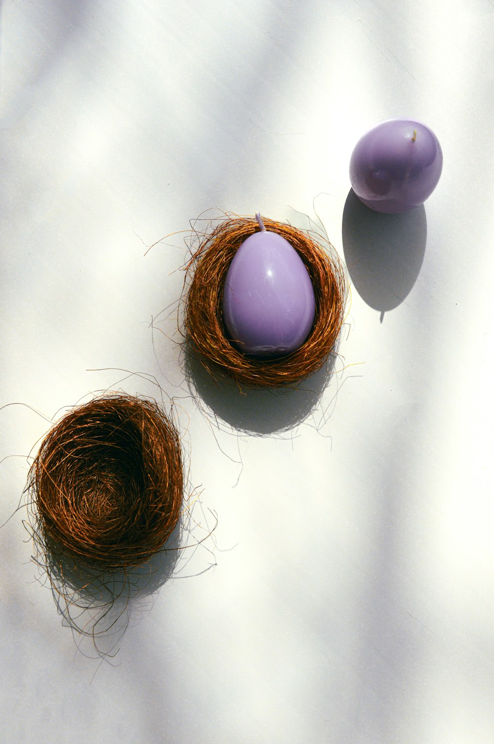 a couple of eggs sitting on top of a white table