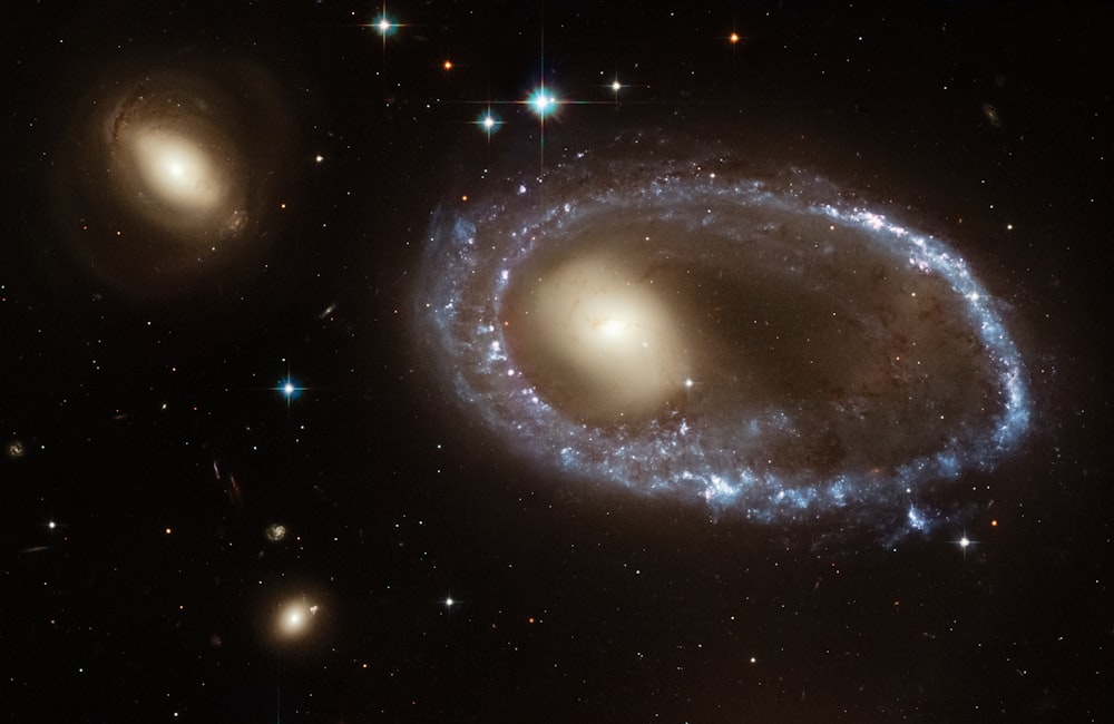 two spiral galaxy like objects in the sky