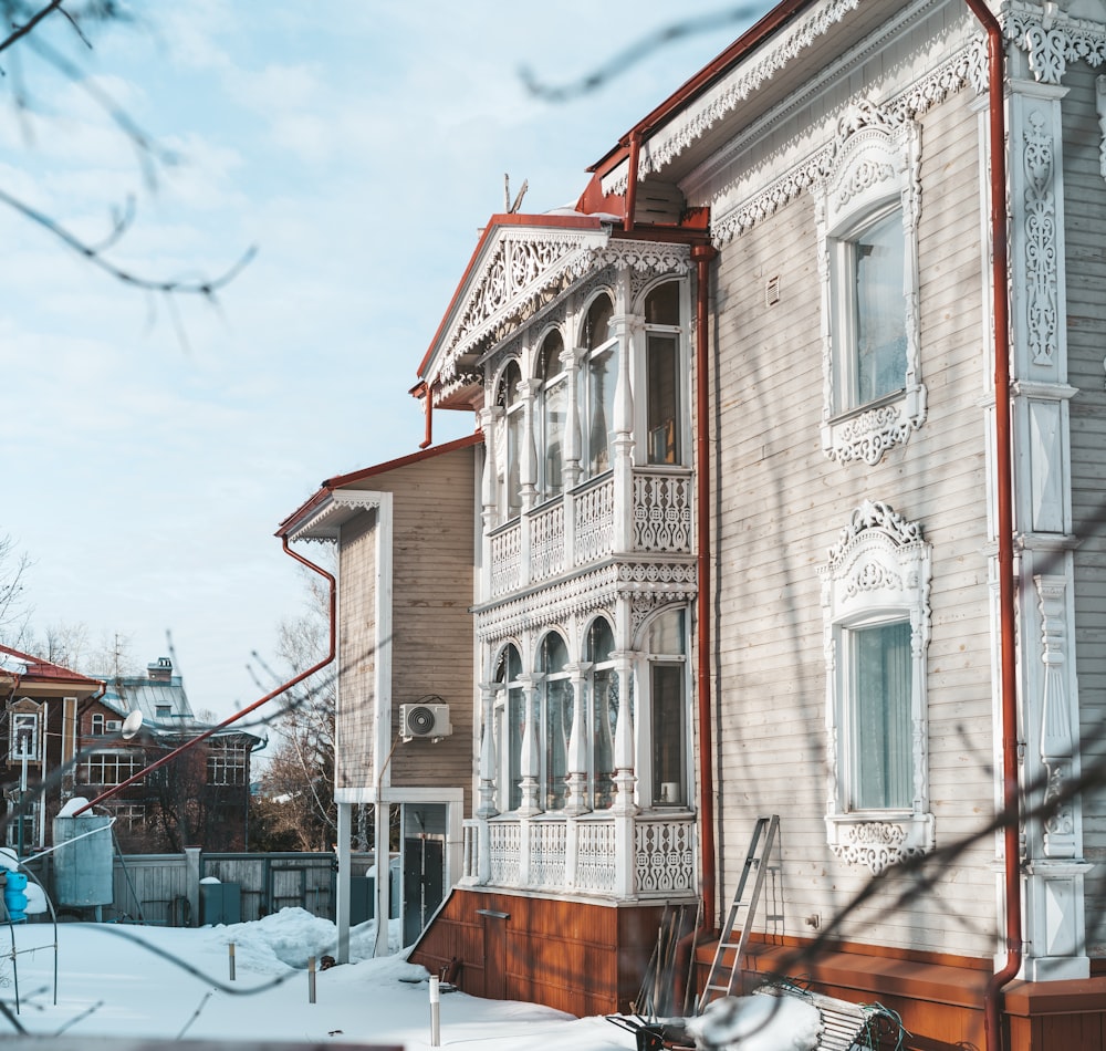 a house with a lot of snow on the ground