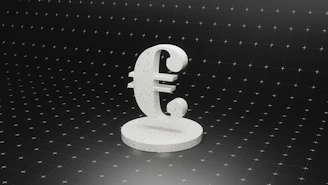 a white object sitting on top of a black surface