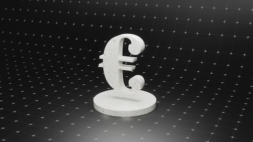 a white object sitting on top of a black surface