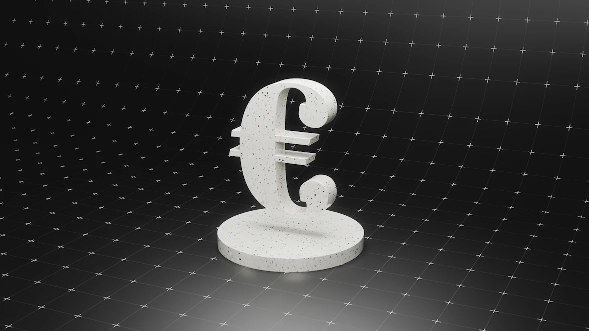 a white object sitting on top of a black surface