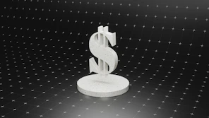 a dollar sign on top of a round object