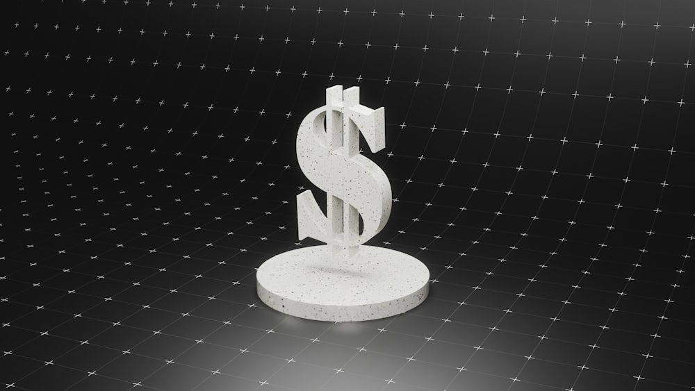 a dollar sign on top of a round object