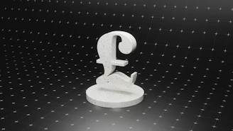 a white object sitting on top of a black surface