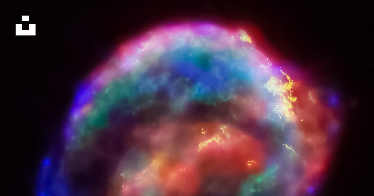 A Very Colorful Object In The Dark Sky Photo Free Outer Space Image a-very-colorful-object-in-the-dark-sky-photo-free-outer-space-image