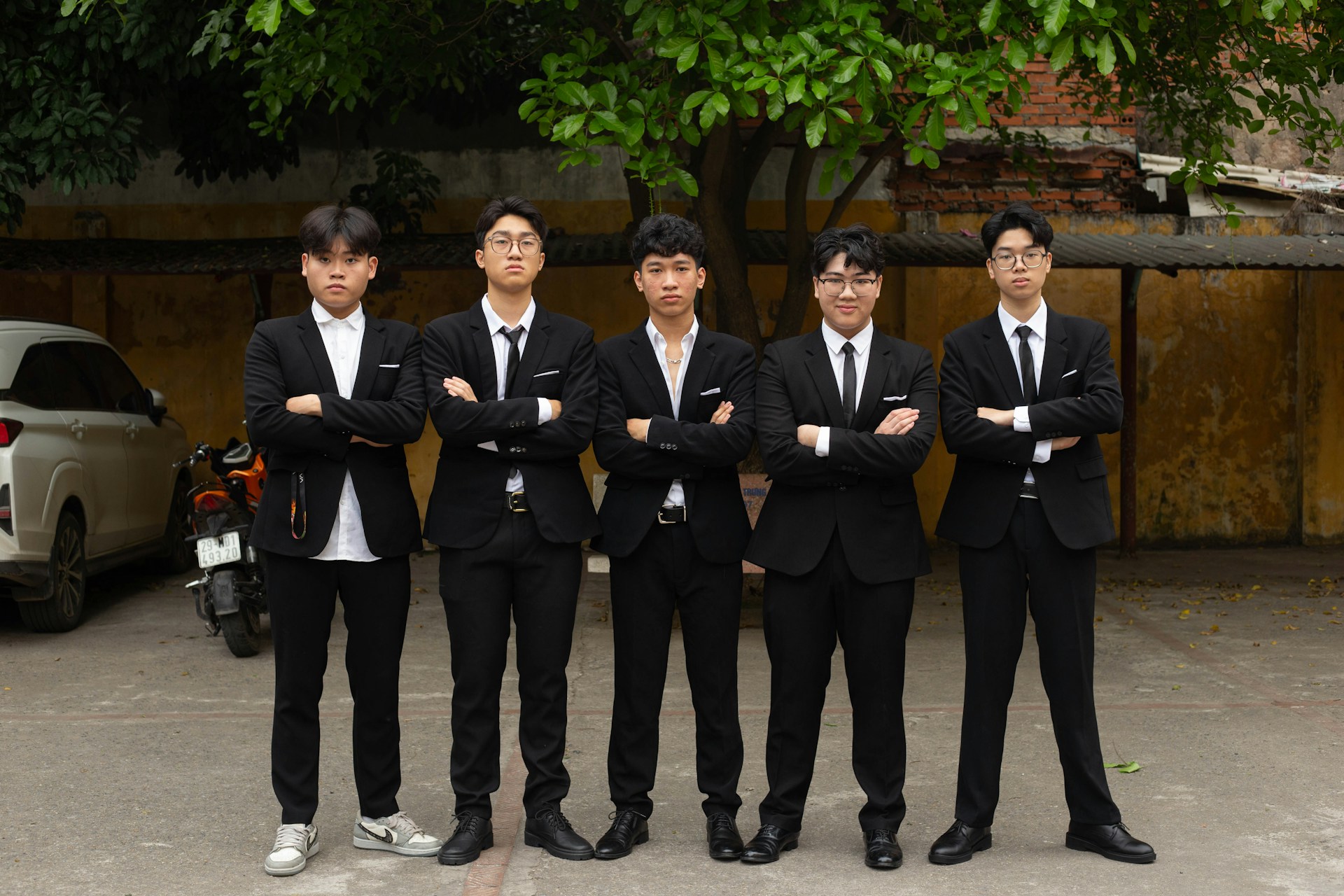 a group of young men standing next to each other