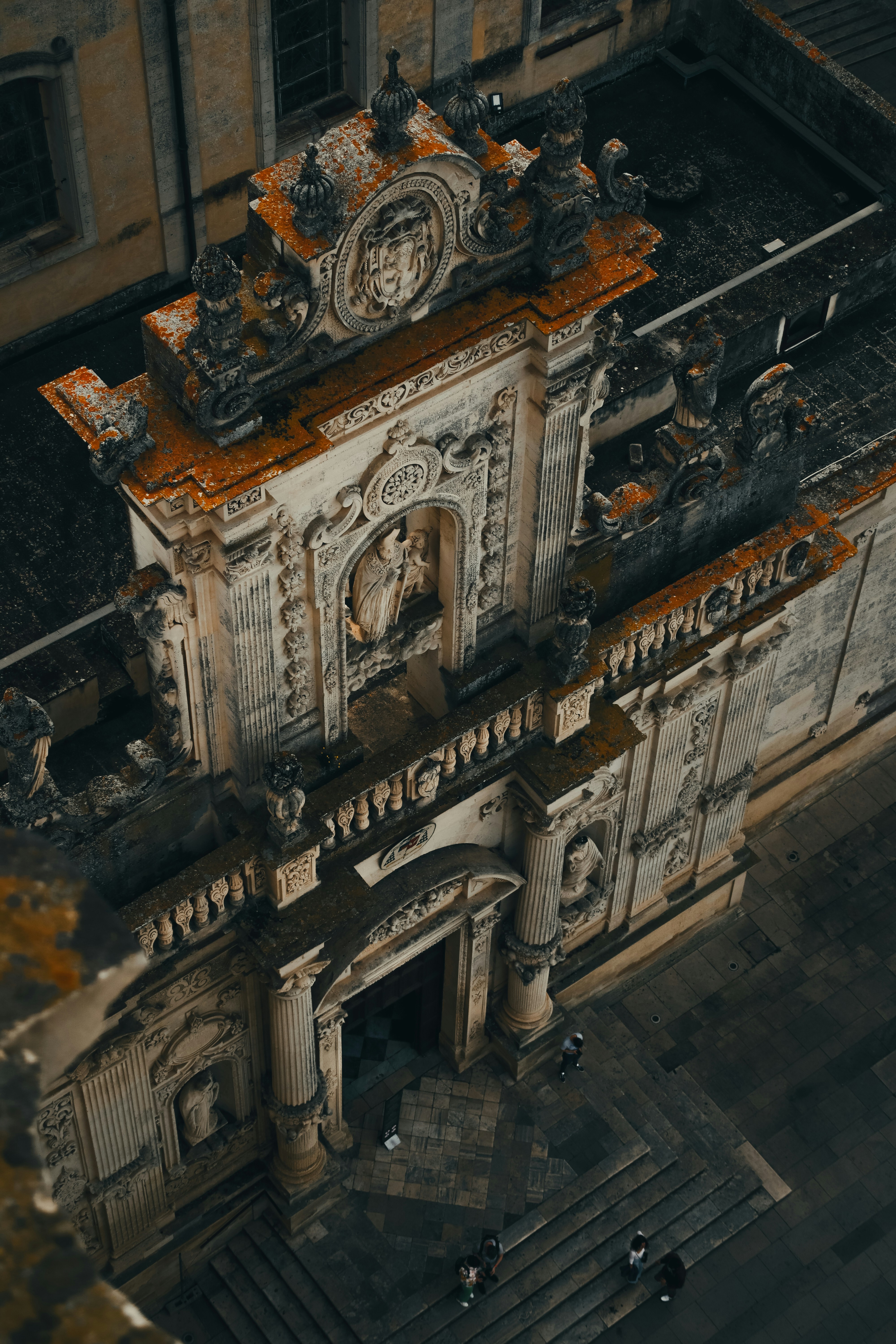 an aerial view of a building with a clock tower