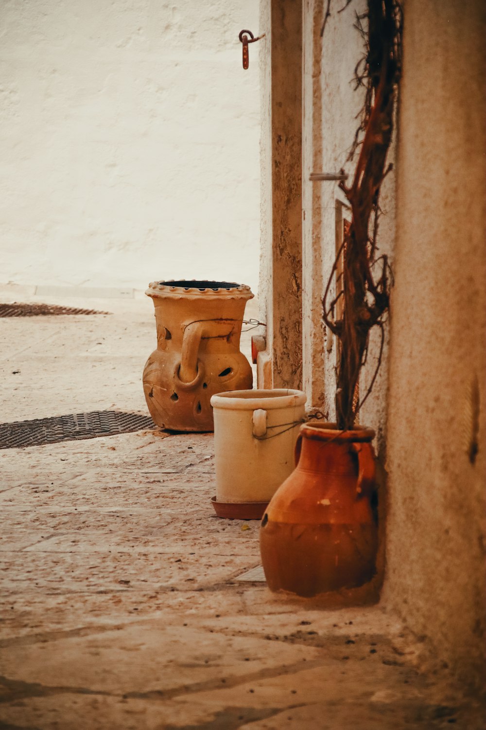 a couple of vases sitting next to each other