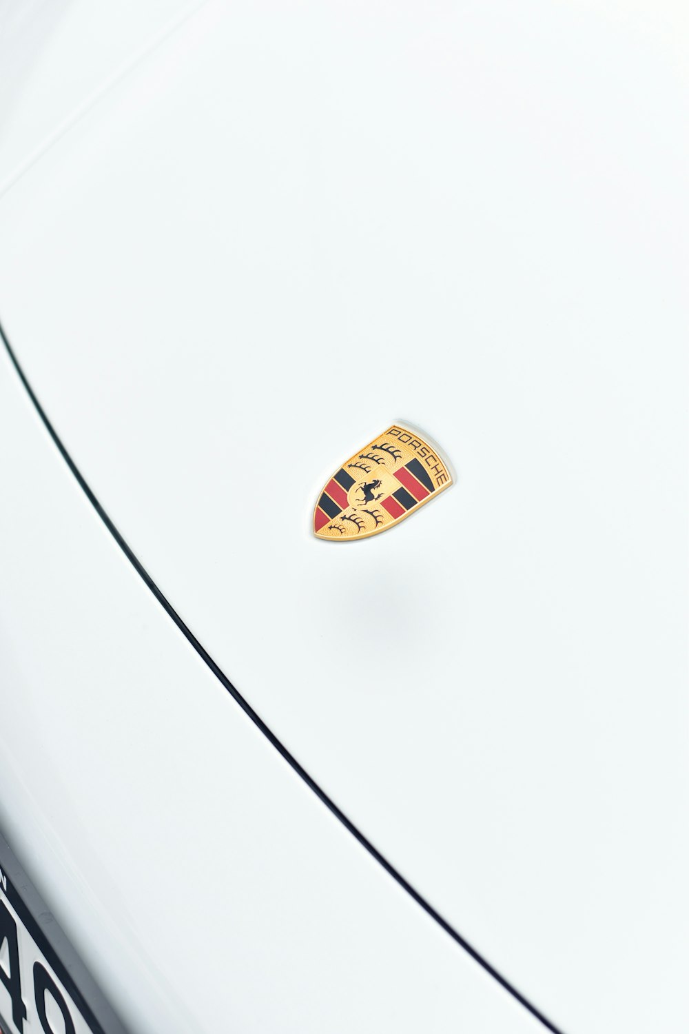 a close up of a car with a badge on it