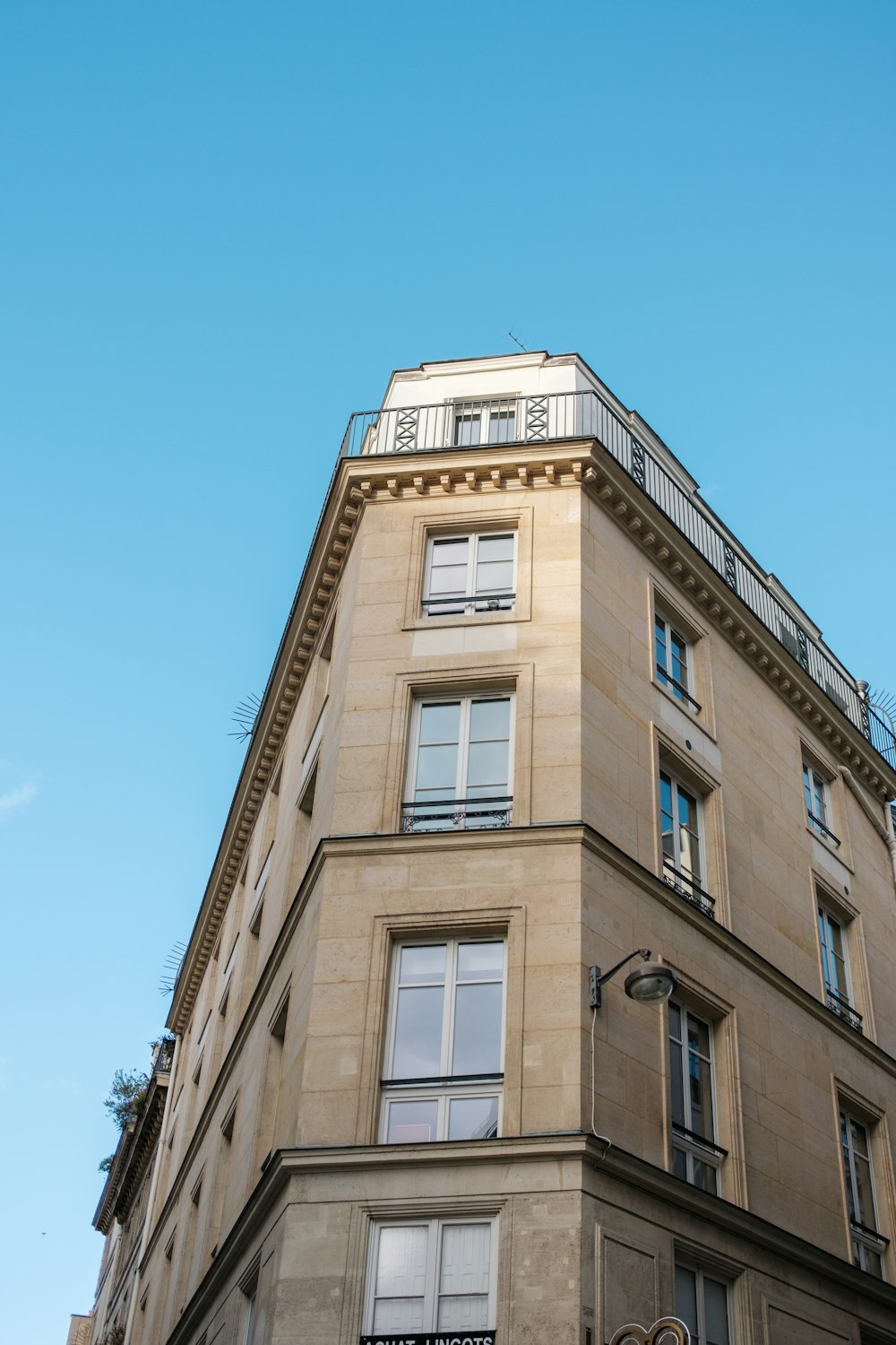 a tall building with a clock on the front of it