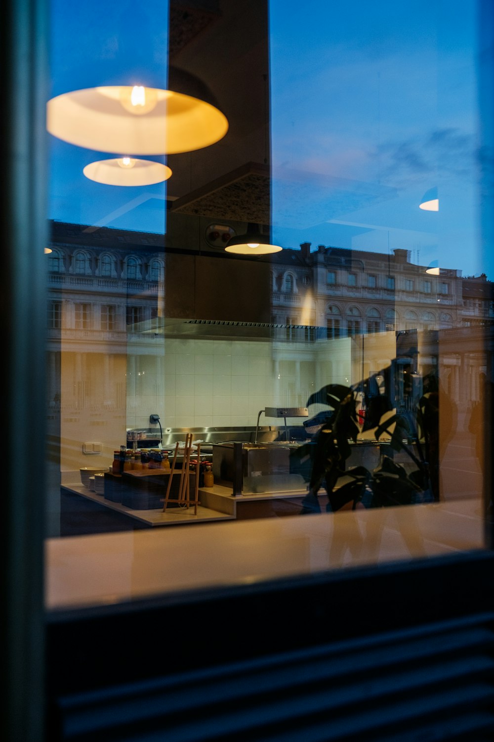 a view of a kitchen through a window