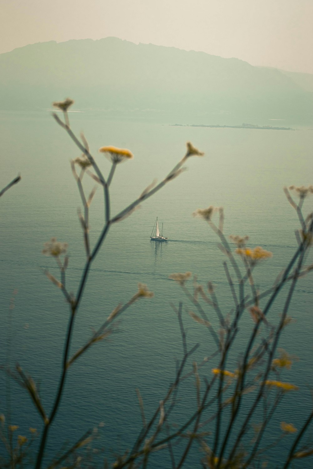 a boat is out in the middle of the water