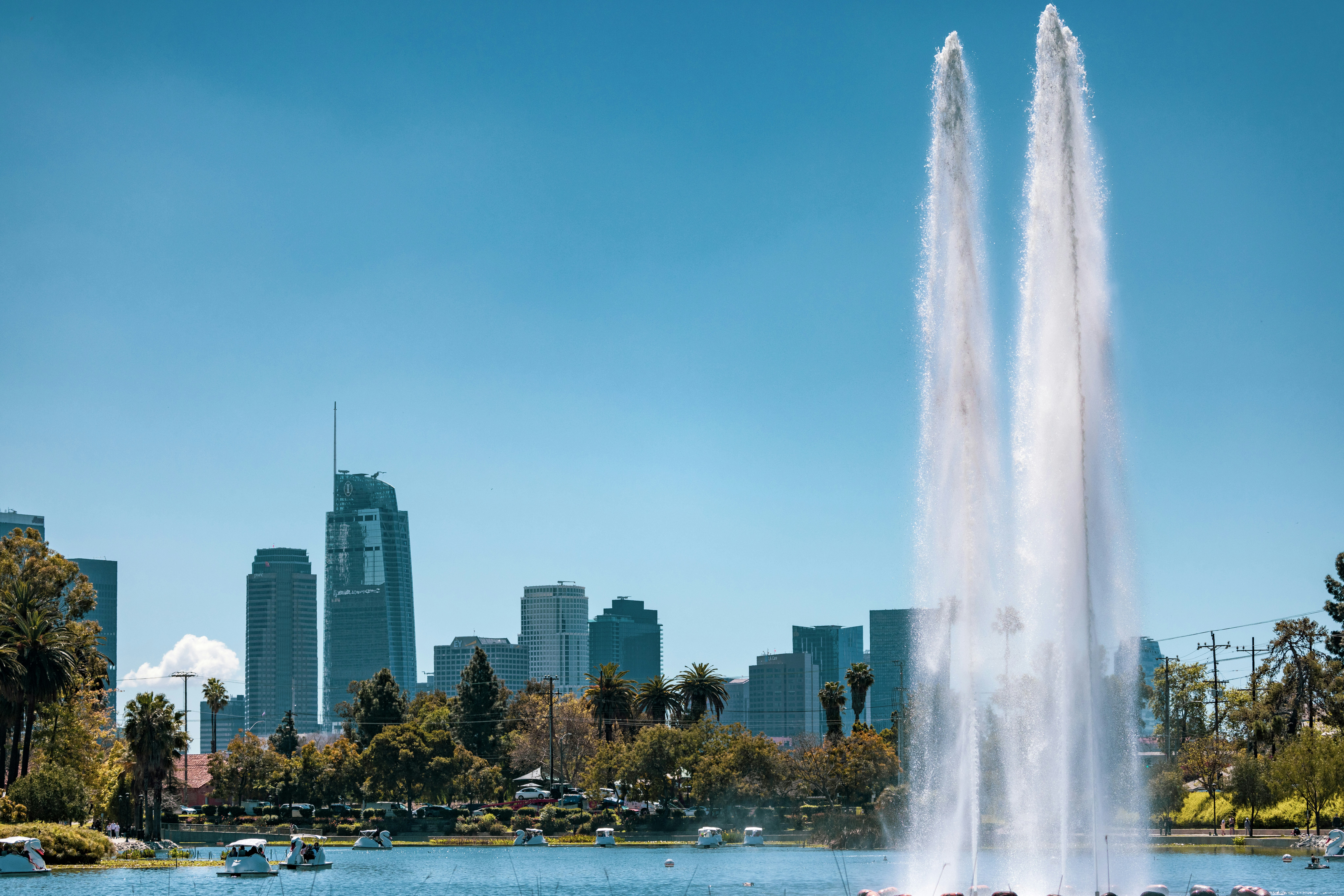 Echo Park Lake fountain with skyline backdrop
