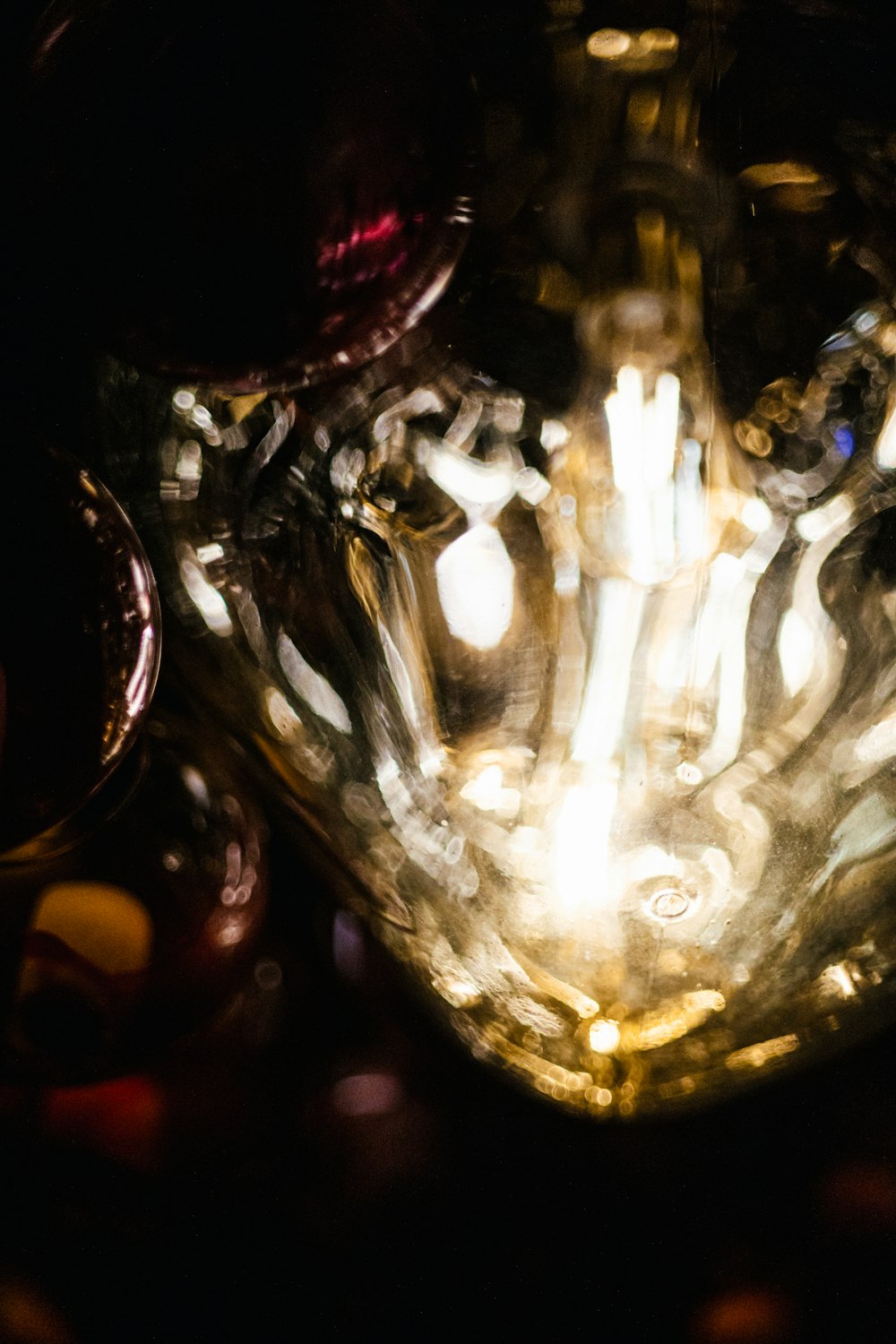 a close up of a light bulb in a glass vase