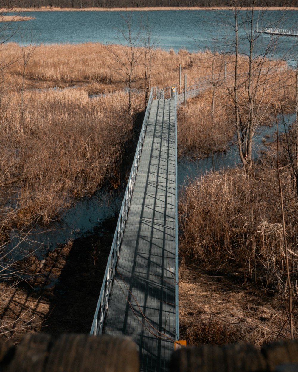 a wooden bridge over a body of water