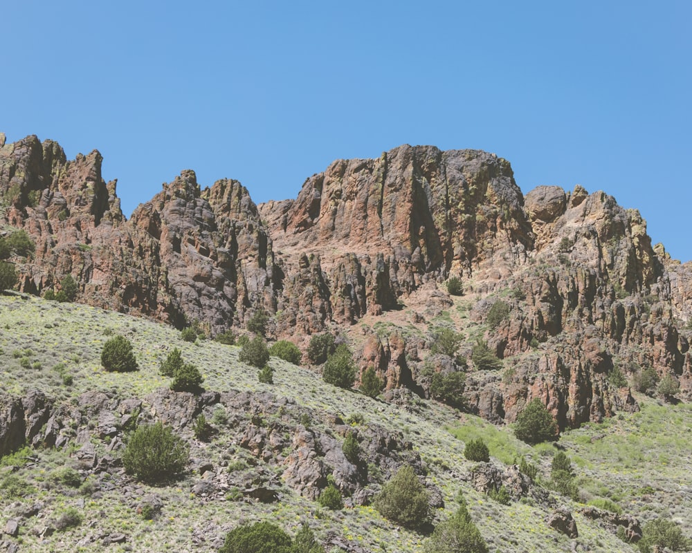 a group of rocks on the side of a mountain