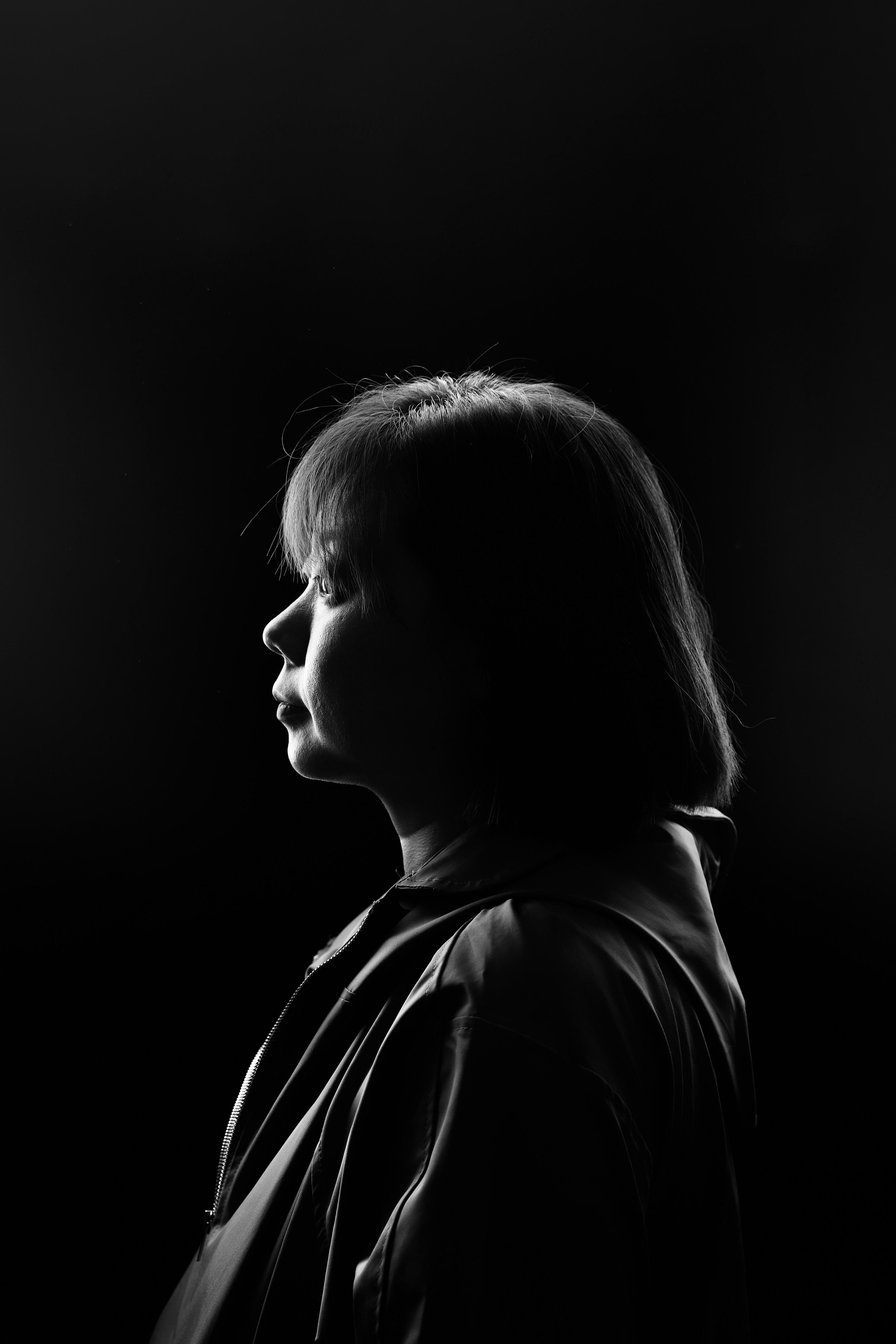 a black and white photo of a woman