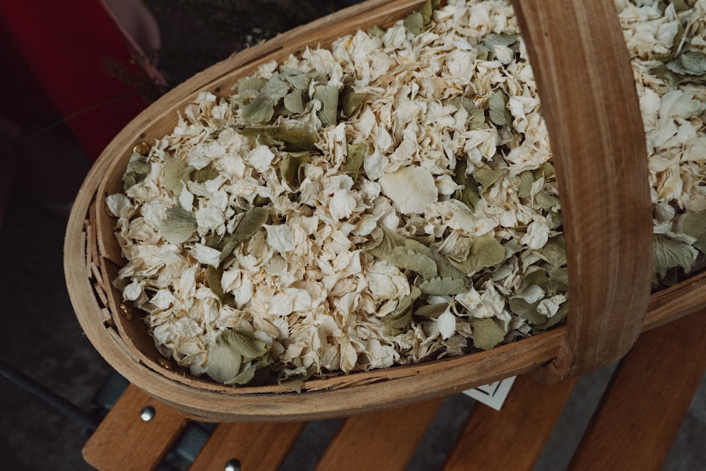 a wooden basket filled with lots of food