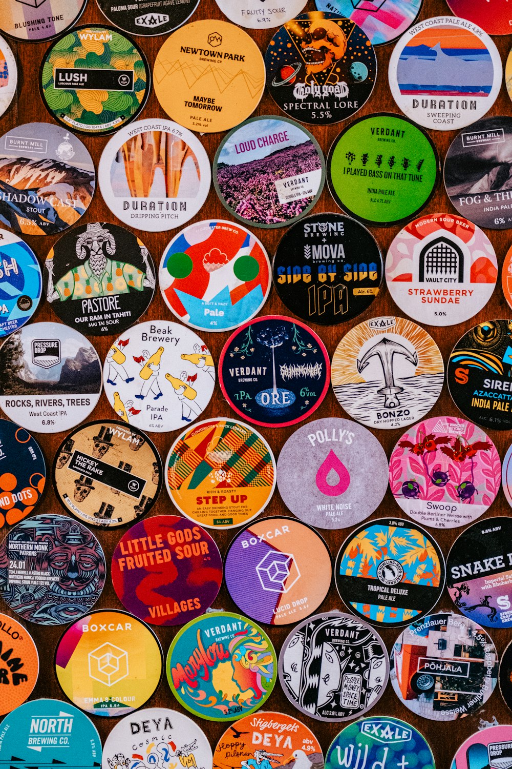 a wall full of different colored and black and white buttons