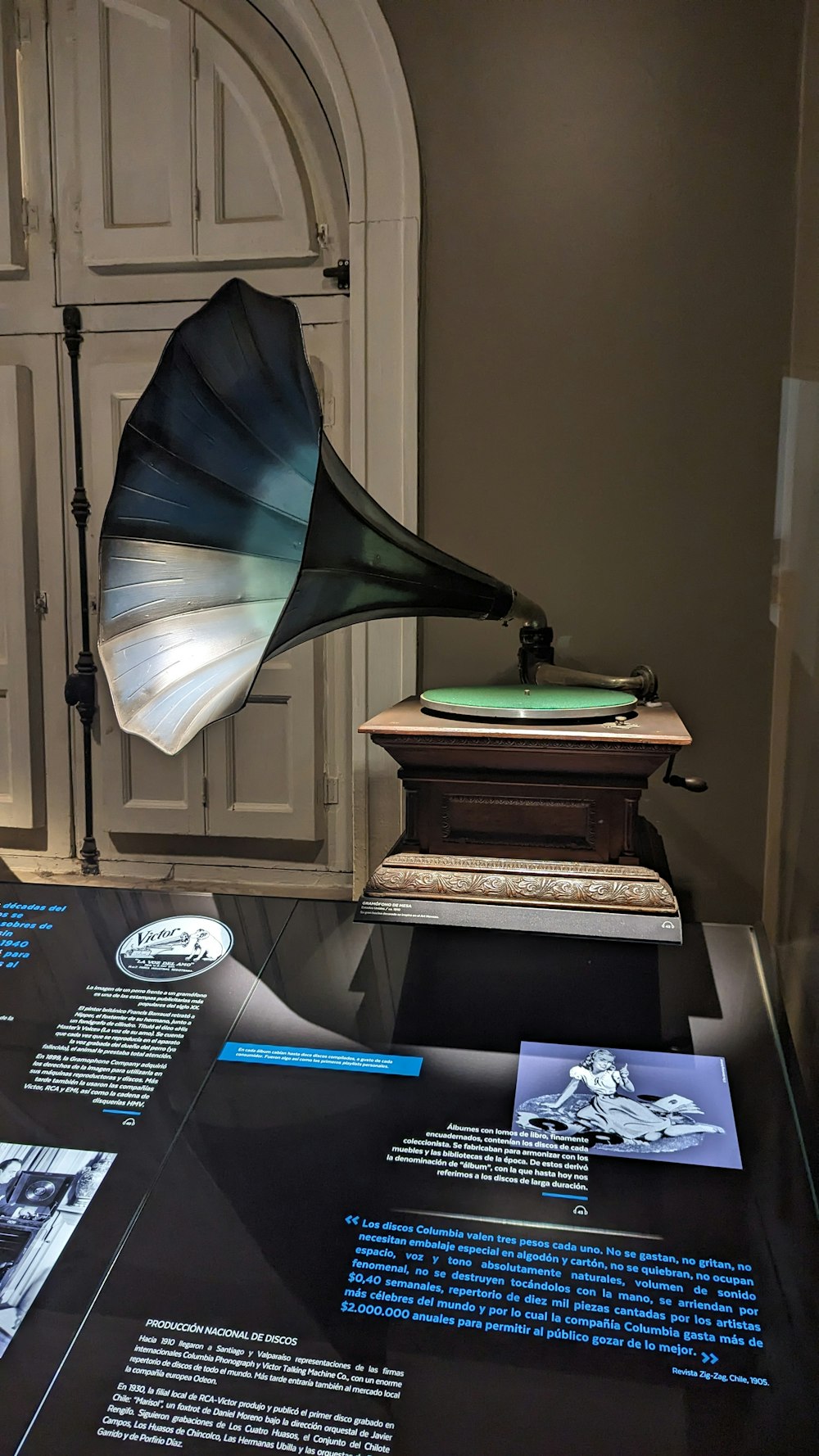 an old record player on display in a museum