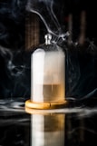 a glass clochet with smoke coming out of it