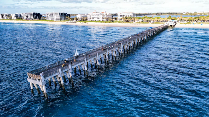 Long fishing pier over the ocean in South Florida