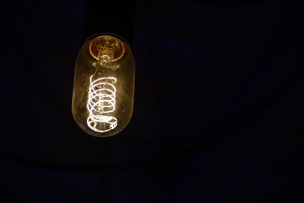 a light bulb that is turned on in the dark