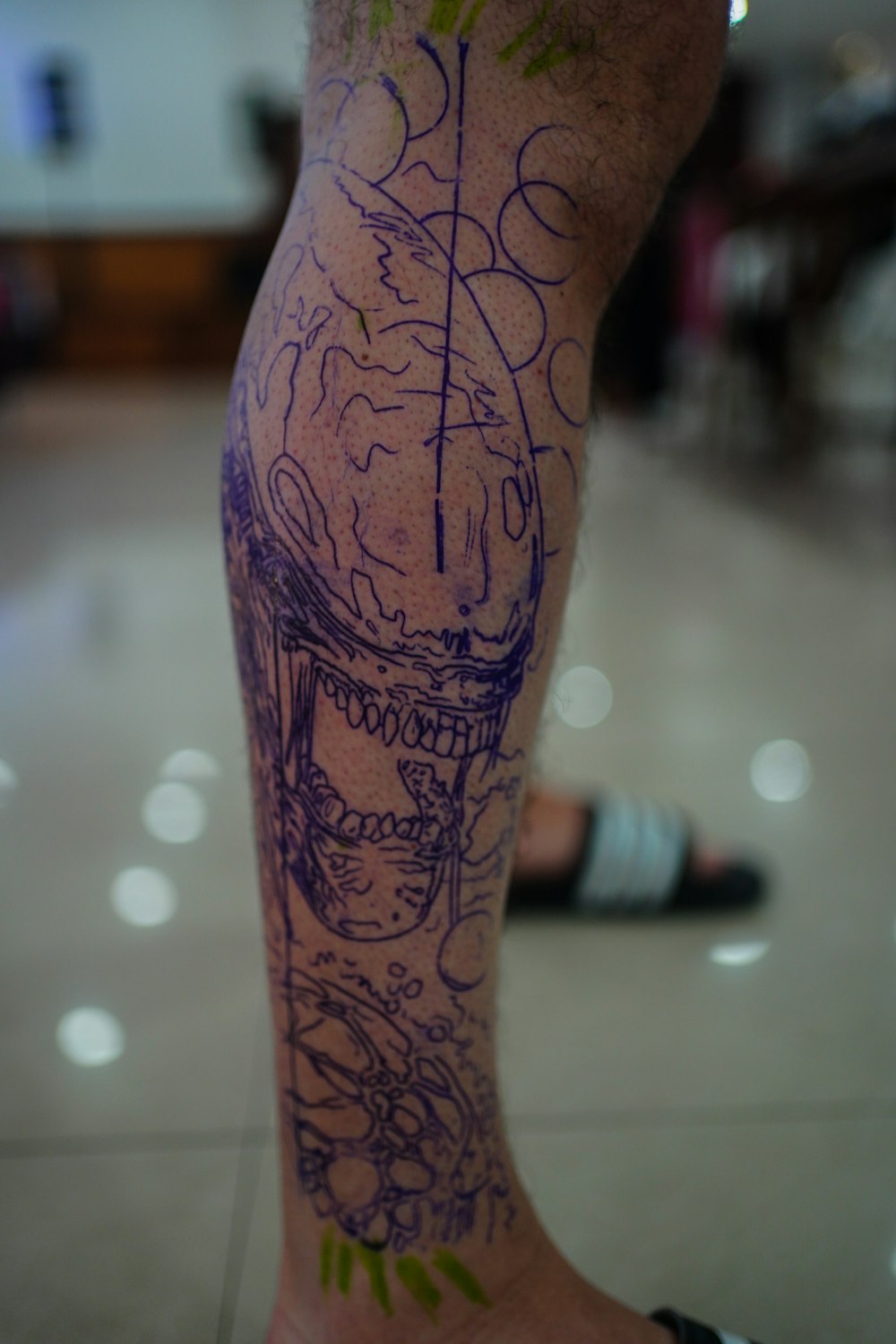 a person with a tattoo on their leg