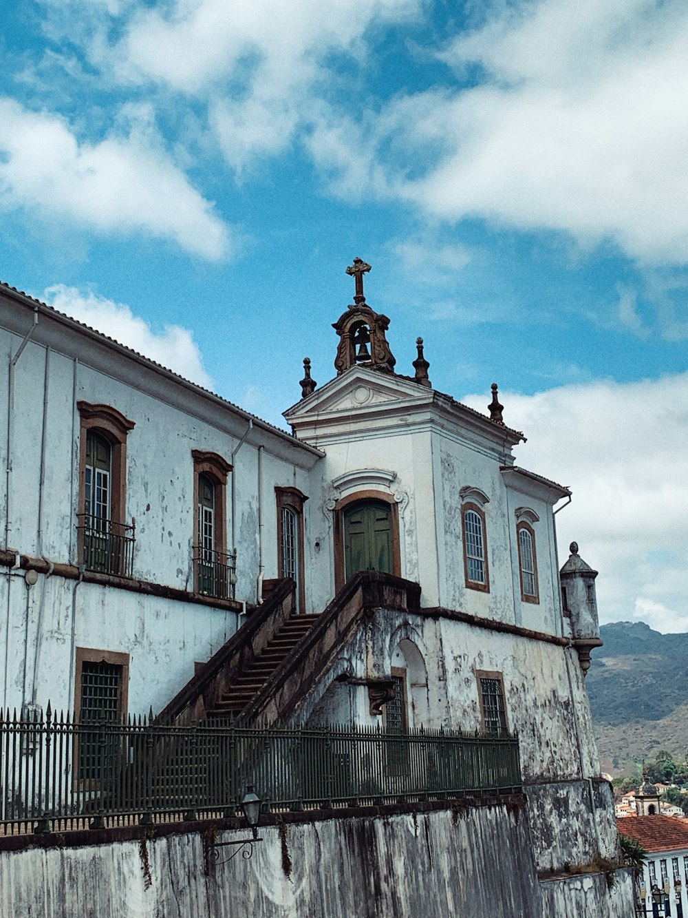 an old building with a clock tower on top of it