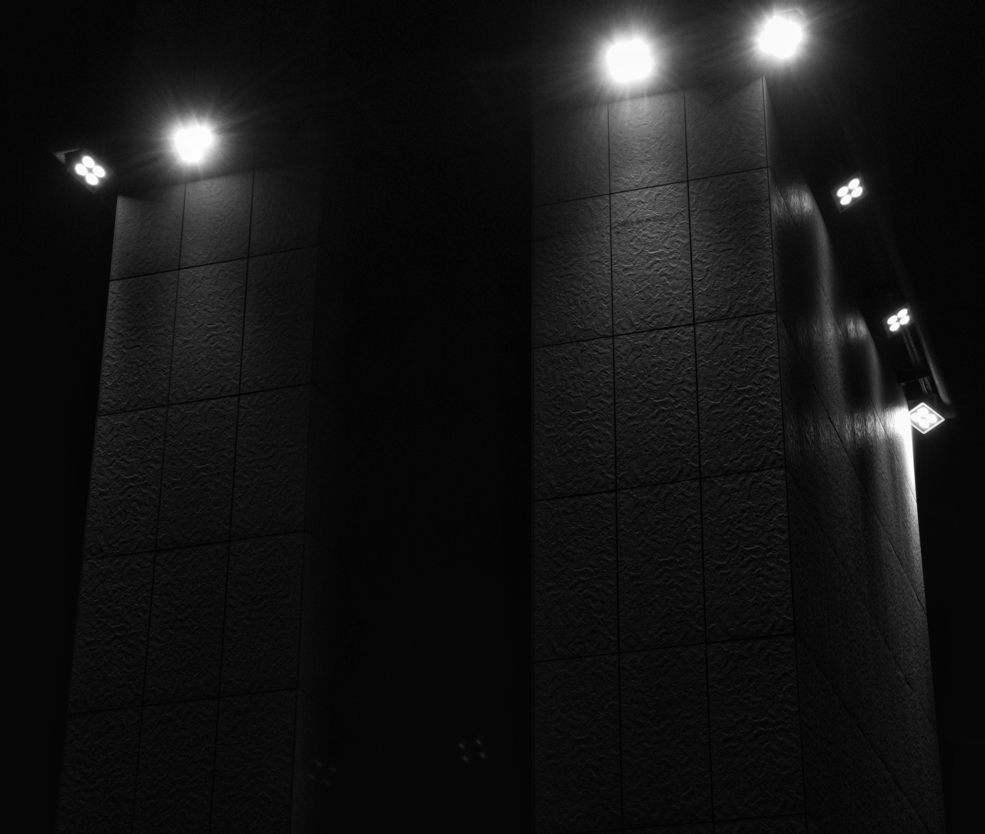 a couple of lights that are on a wall