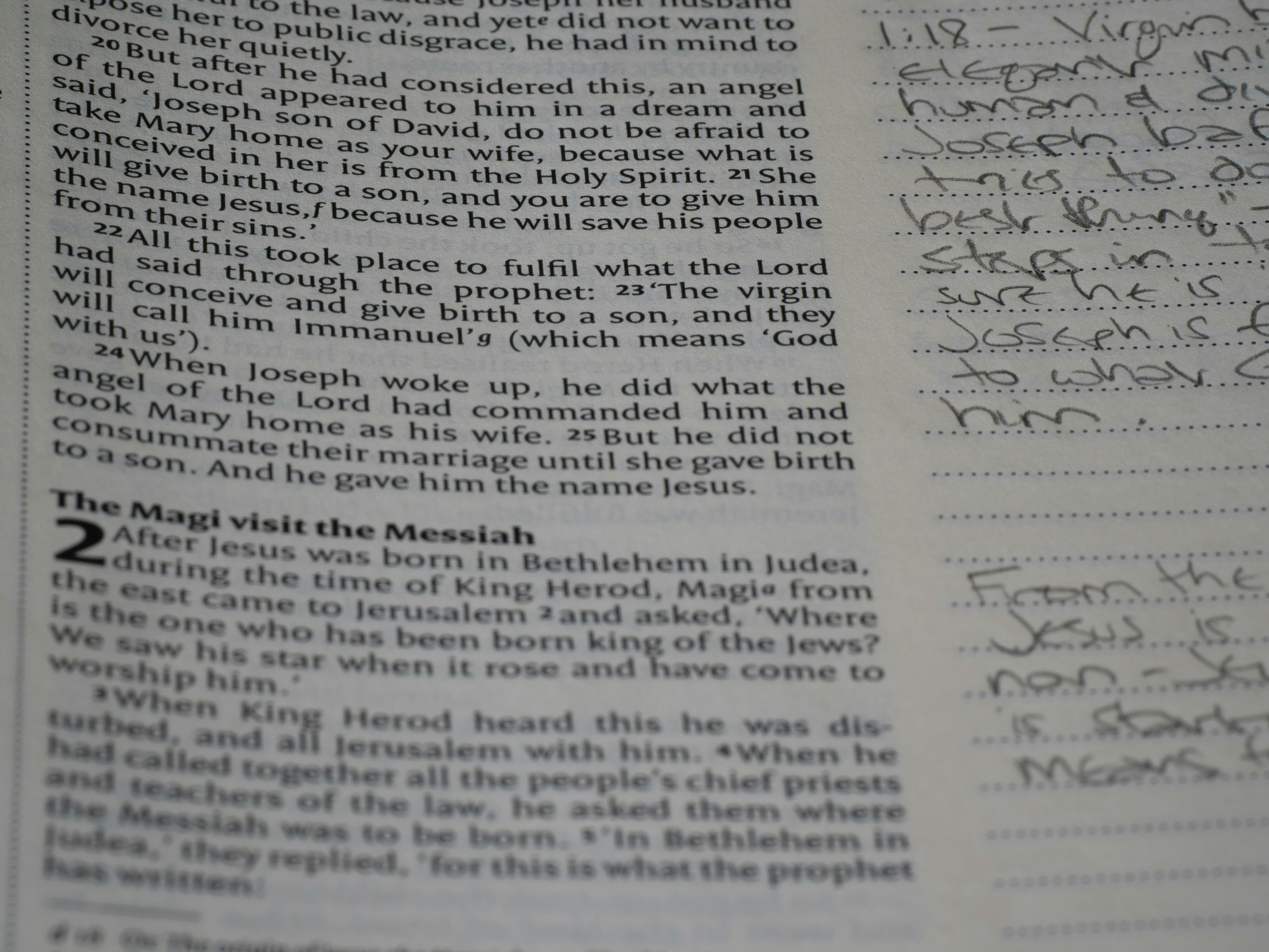 a close up of a book with writing on it