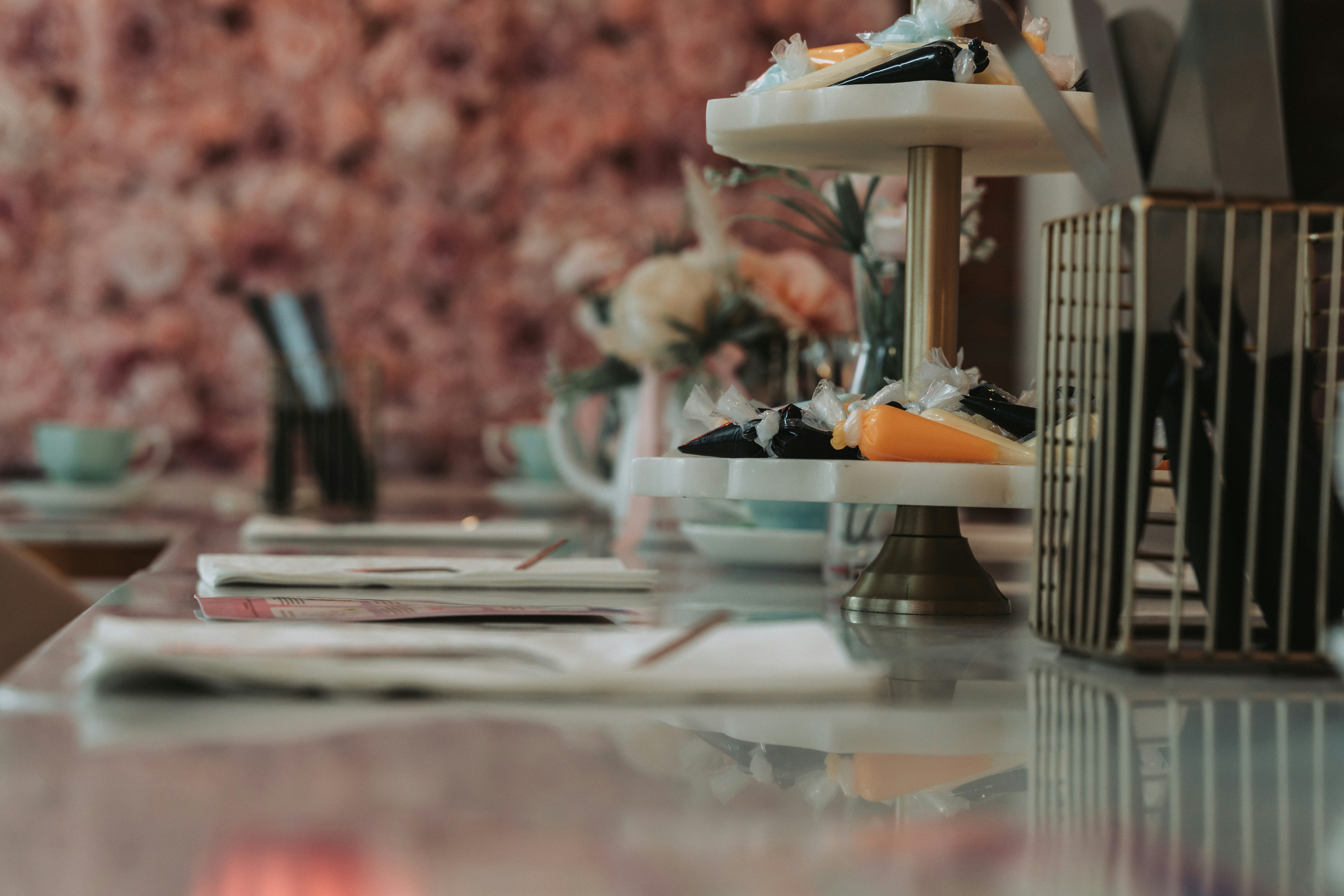 a table topped with lots of plates of food