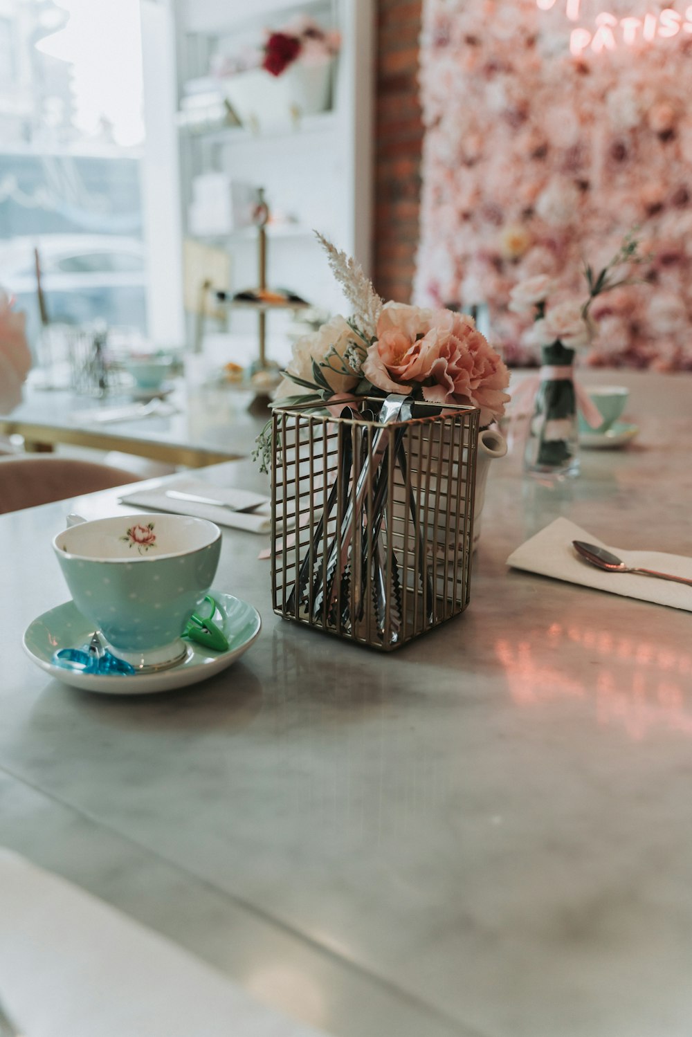 a cup and saucer sitting on a table