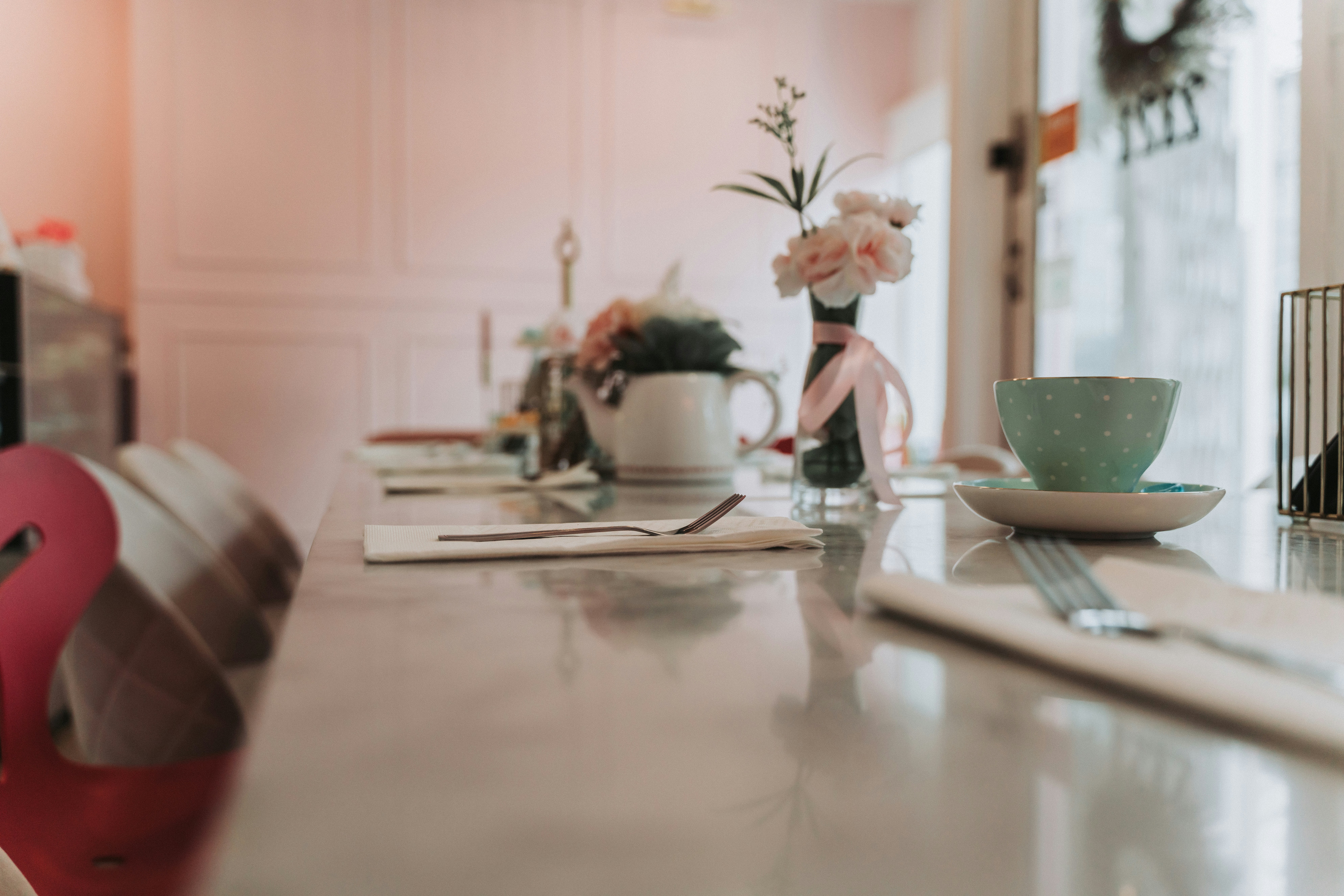 a table with a vase of flowers on it